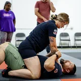 The Safety Skill Nobody Talks About: What Grappling Does to Your Brain's Threat Response