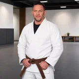 Tom Hardy Just Got His Brown Belt at 48 — What 15 Years on the Mat Actually Looks Like