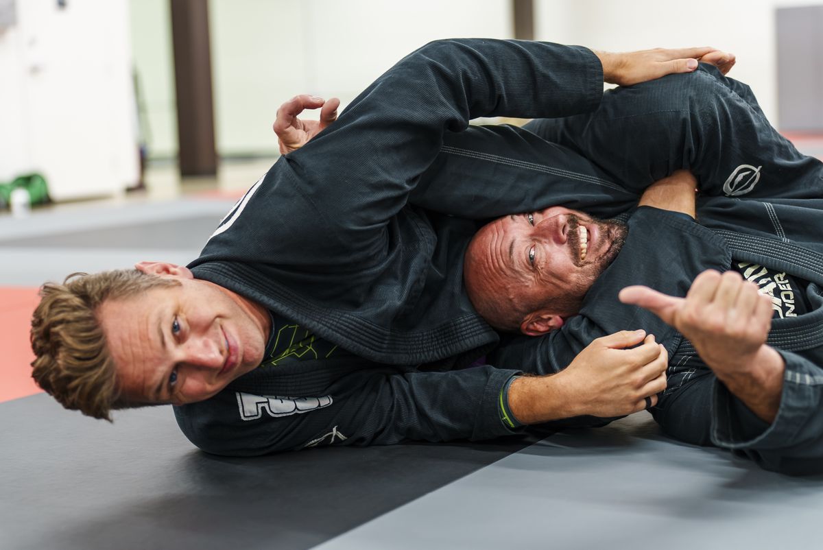 gi two men side control sparring closeup