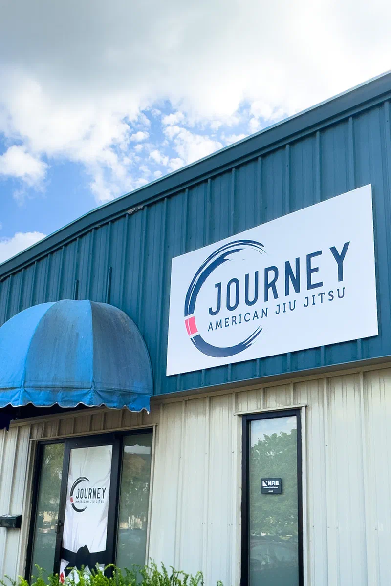 Journey BJJ Academy exterior side view showing parking and accessibility