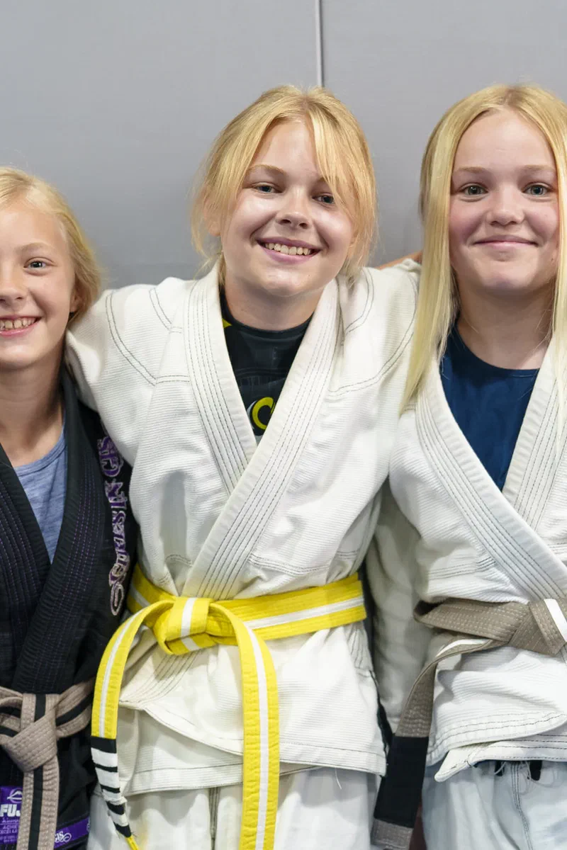 Journey BJJ kids community showing friendship and support after training