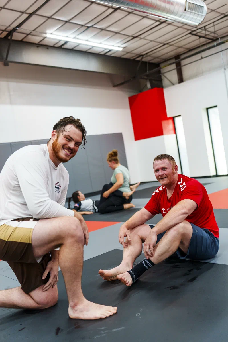 Journey BJJ adult community team photo showing diverse group of students