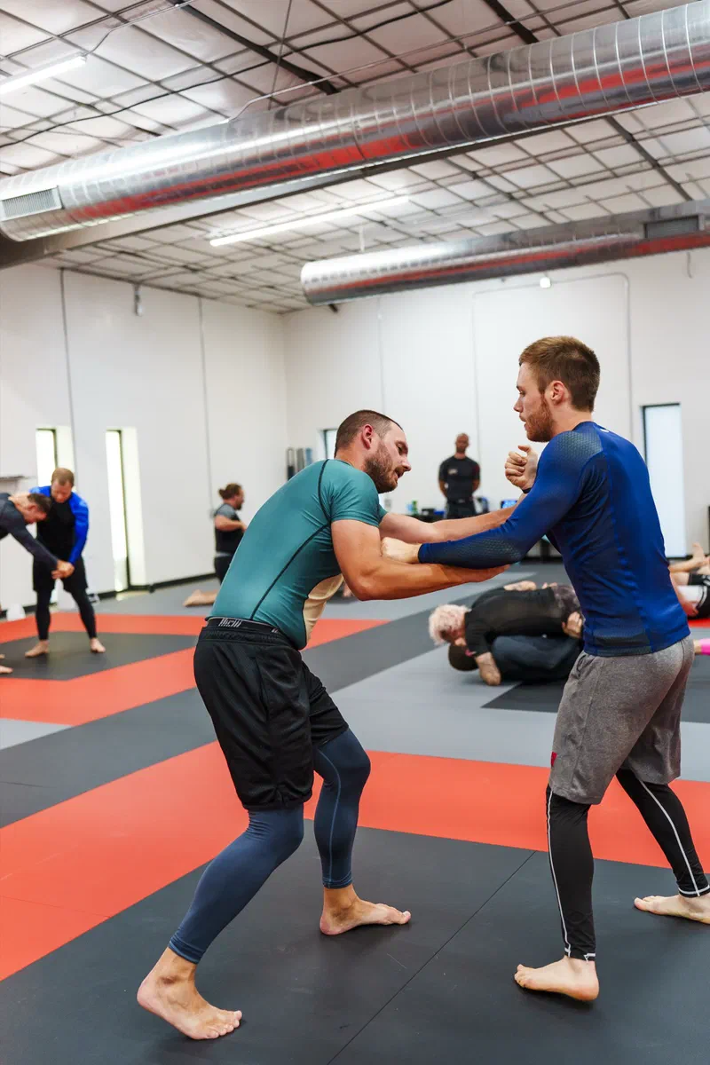 Students students in no gi class lining up after a good workout.