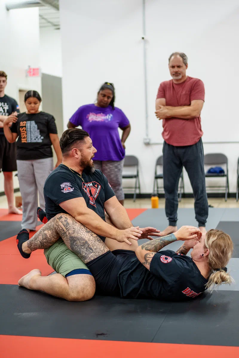 Madison adult self-defense students practicing spatial awareness footwork at Journey BJJ