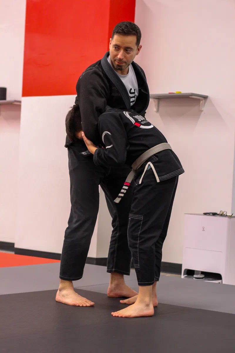 Kids practicing how to control each other on the ground