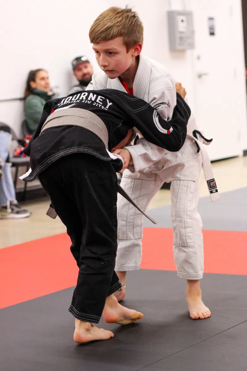 Children practicing self-defense techniques in a safe, supervised Madison environment
