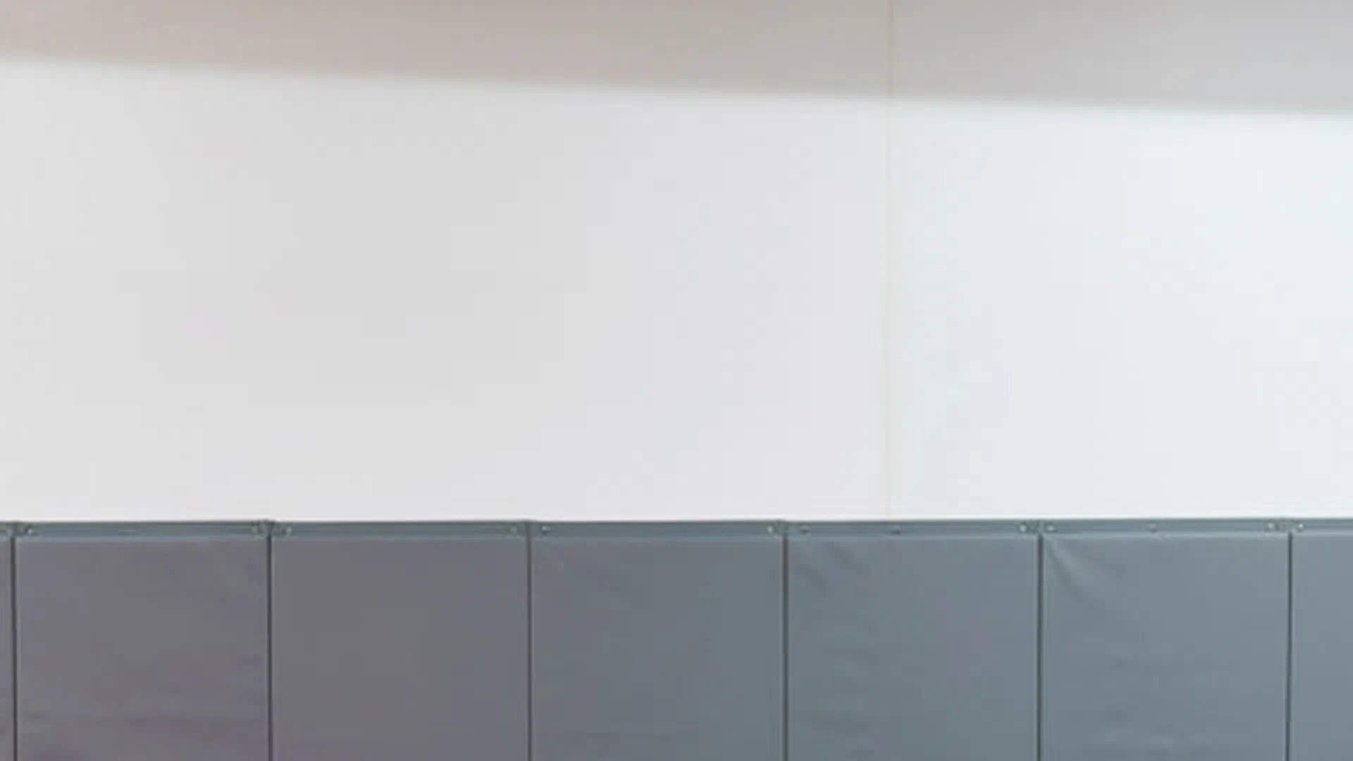 Interior view of Journey BJJ Academy showing branded walls and training environment
