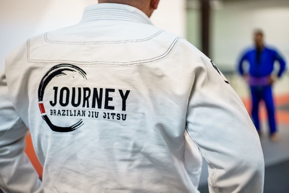 journey bjj gi back logo instructor on mat