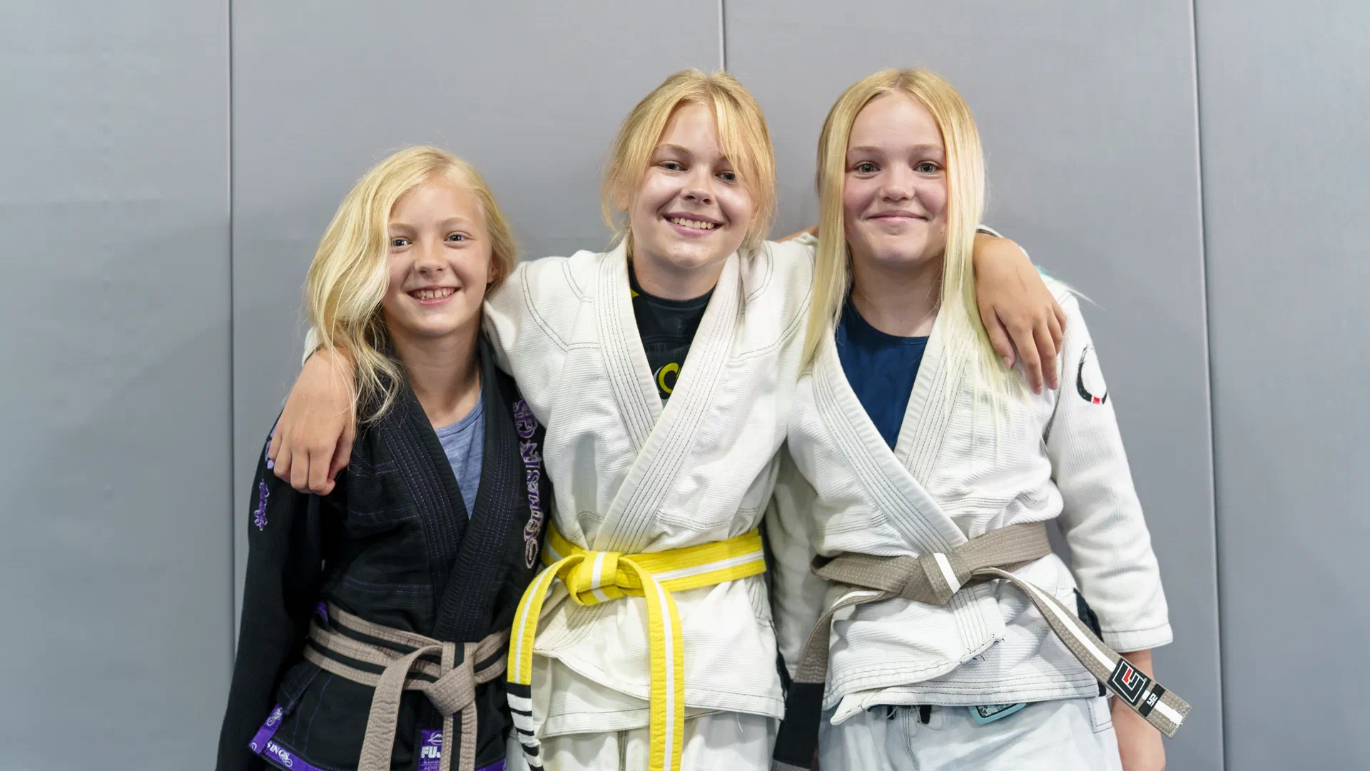 Journey BJJ kids community showing friendship and support after training