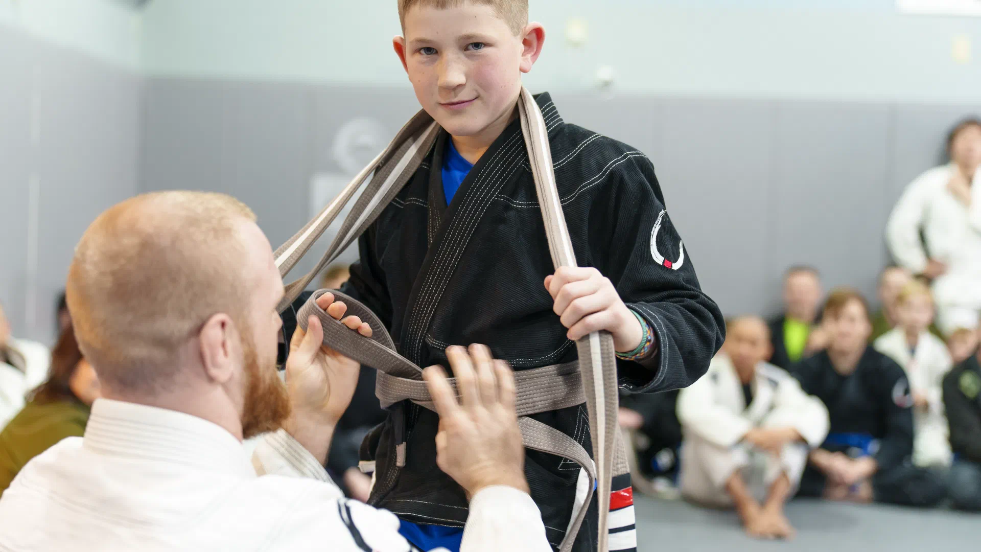 Young students learning self-defense and confidence through kids martial arts training