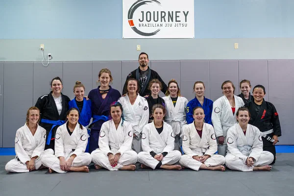Group of women together after Jiu-Jitsu training at Journey BJJ Madison