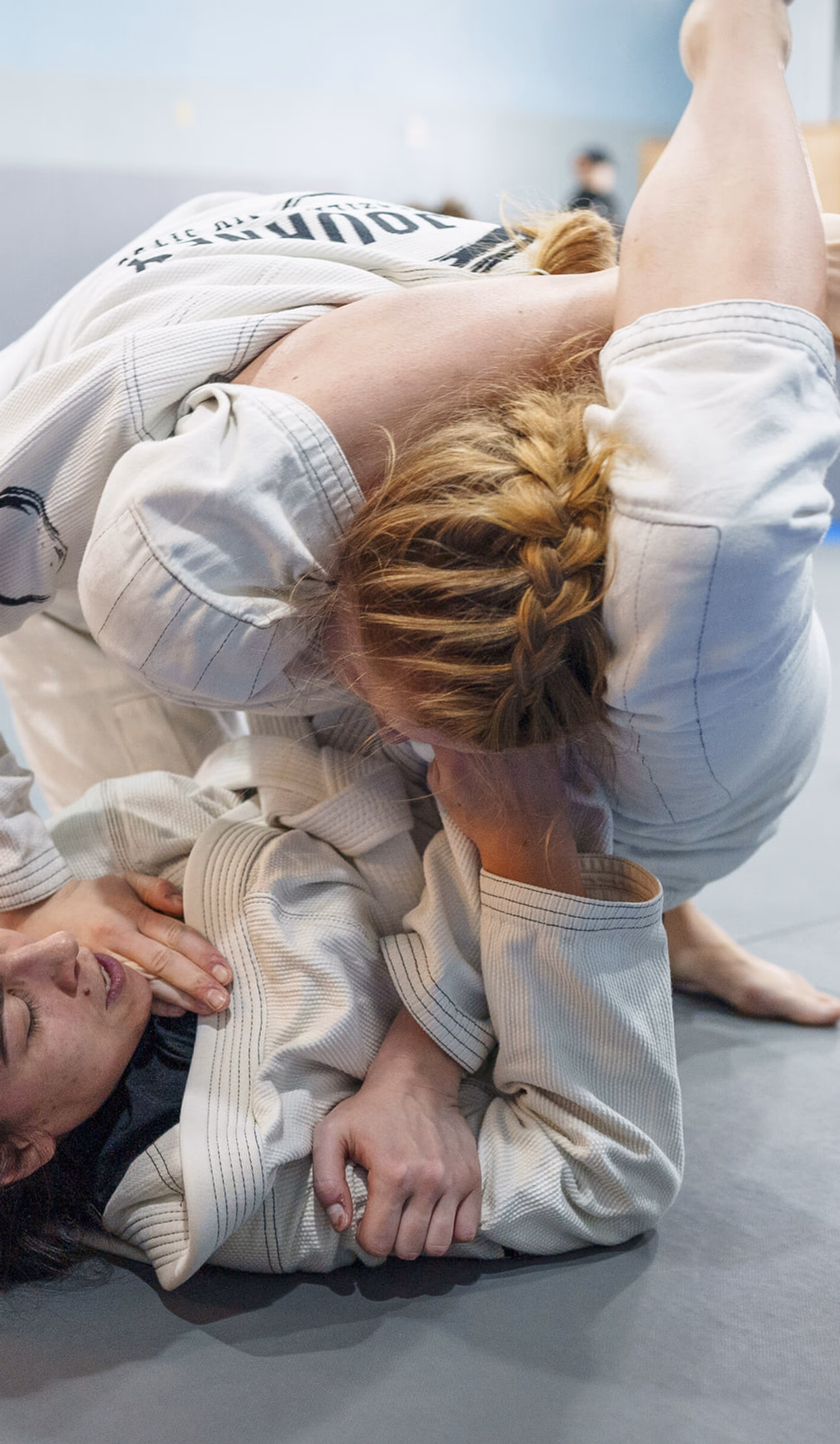 Women training Brazilian Jiu-Jitsu techniques in Madison Wisconsin at Journey Academy